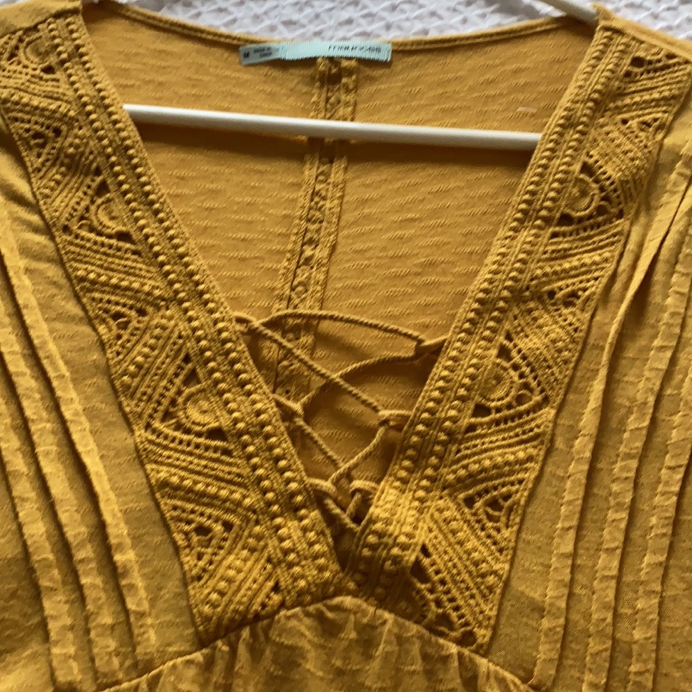 Mustard Maurices top with detail